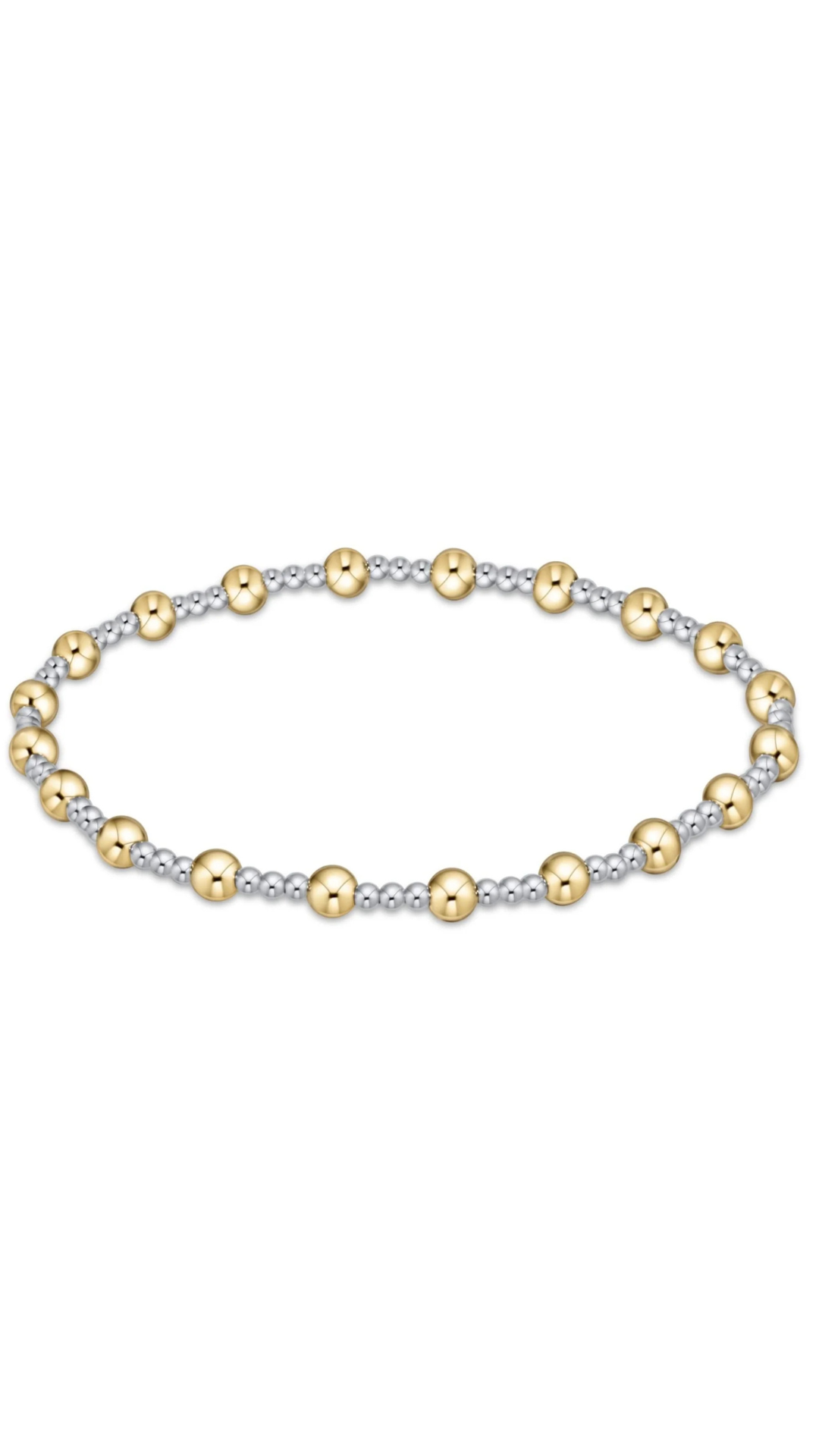 A delicate beaded bracelet featuring alternating polished yellow gold and textured silver beads, arranged in an oval shape against a solid white background.