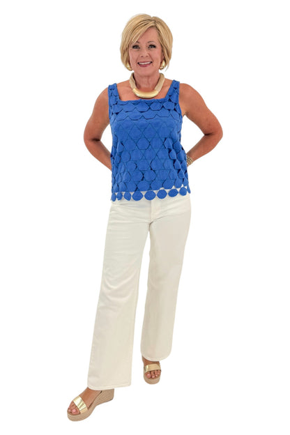 Front view of woman wearing Swagger Boutique’s Cobalt Sleeveless Lace Tank with jeans against white studio background.
