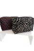 Two zippered cosmetic pouches displayed on a white stand against a white background. The front pouch has a black and beige zebra print, and the back pouch has a dark brown and black leopard print.
