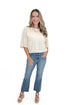 Front view of woman wearing Swagger Boutique’s Cream 3/4 Sleeve Lightweight Sweater by Entro with jeans against white studio background.