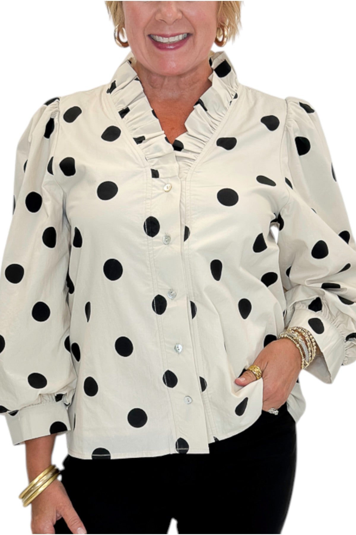 Front detail view of woman wearing Swagger Boutique’s Cream &amp; Black Polka Dot 3/4 Sleeve Top with Kelsey Black Denim Jeans against white studio background.