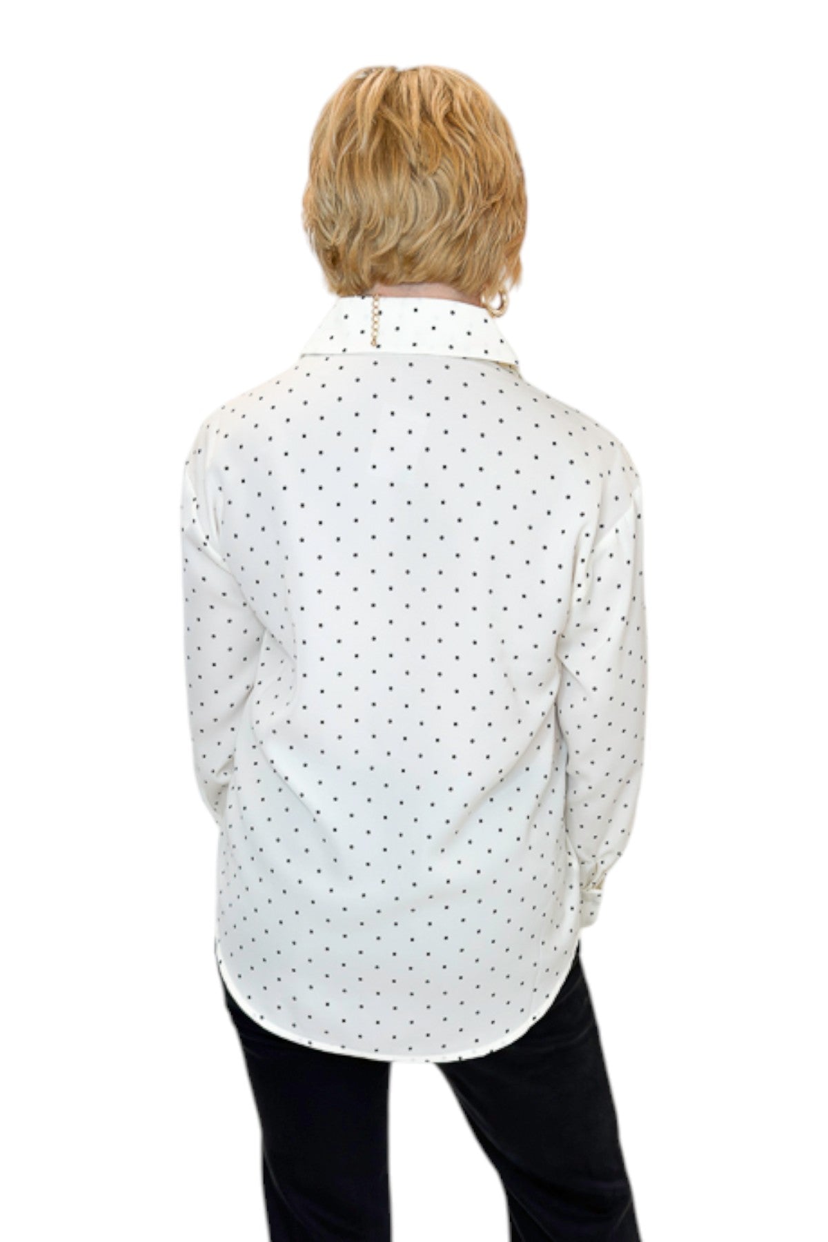 Back view of woman wearing Swagger Boutique’s Cream &amp; Black Polka Dot Satin Button Up Top with jeans against white studio background.