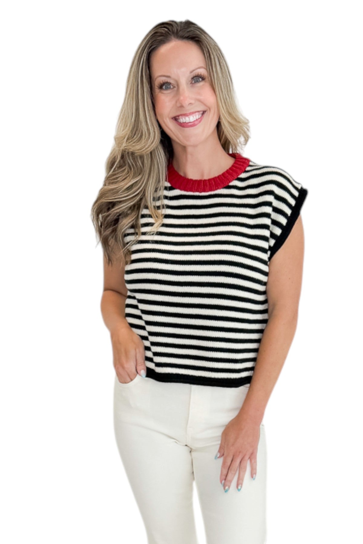 Front view of woman wearing Swagger Boutique’s Cream &amp; Black Striped Sleeveless Sweater with jeans against white studio background.
