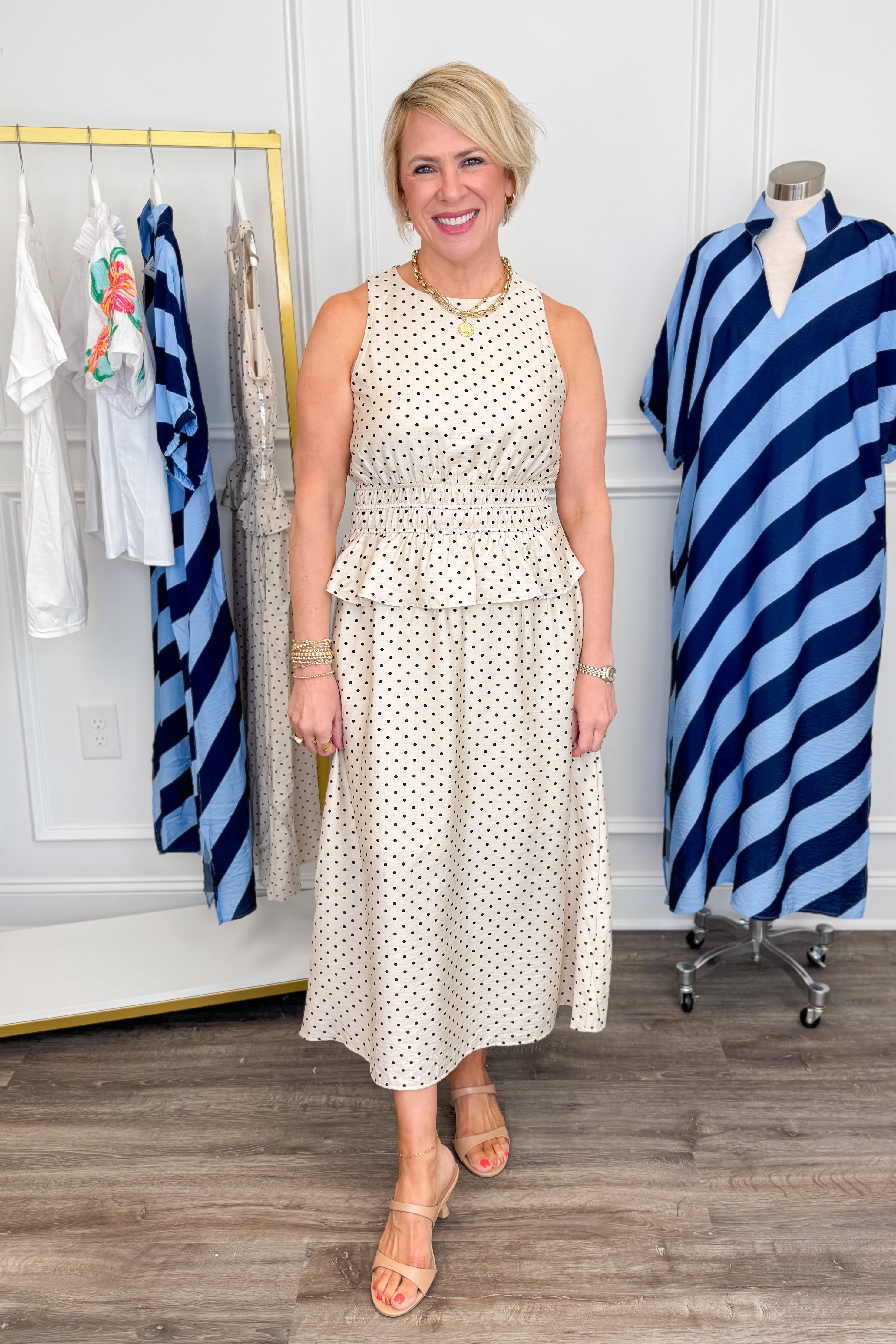 Front picture of woman wearing Cream &amp; Black Polka Dot Ruffle Detail Midi Dress with heels.