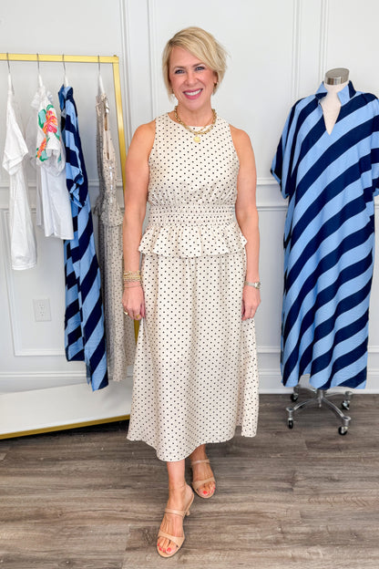 Front picture of woman wearing Cream &amp; Black Polka Dot Ruffle Detail Midi Dress with heels.