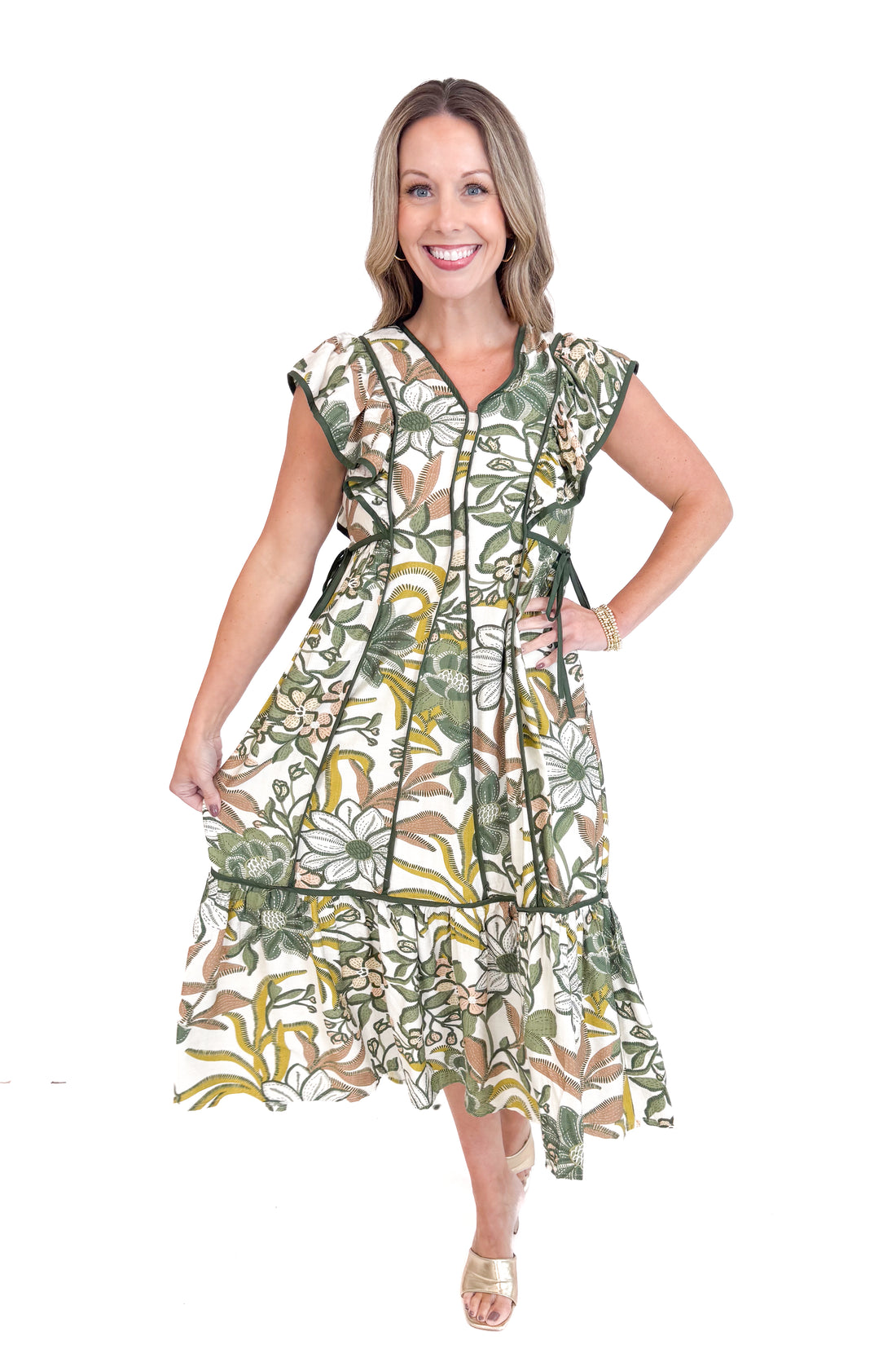 Woman wearing a floral dress on a white background