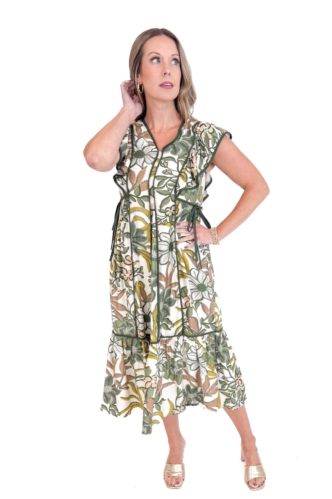 Woman wearing a floral dress on a white background