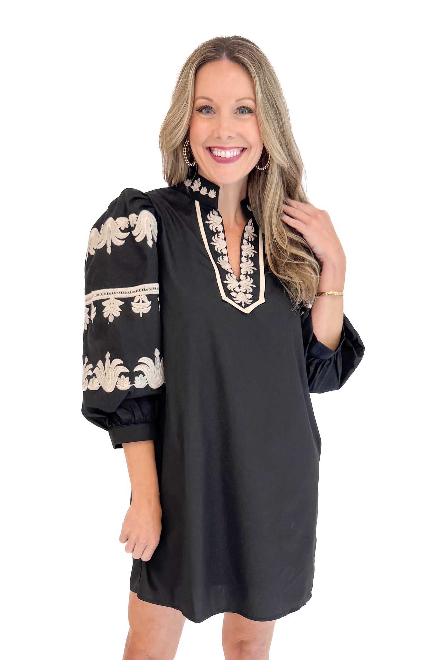 Front view of woman in Black With Cream Embroidery Puff Sleeve Dress by Entro. 