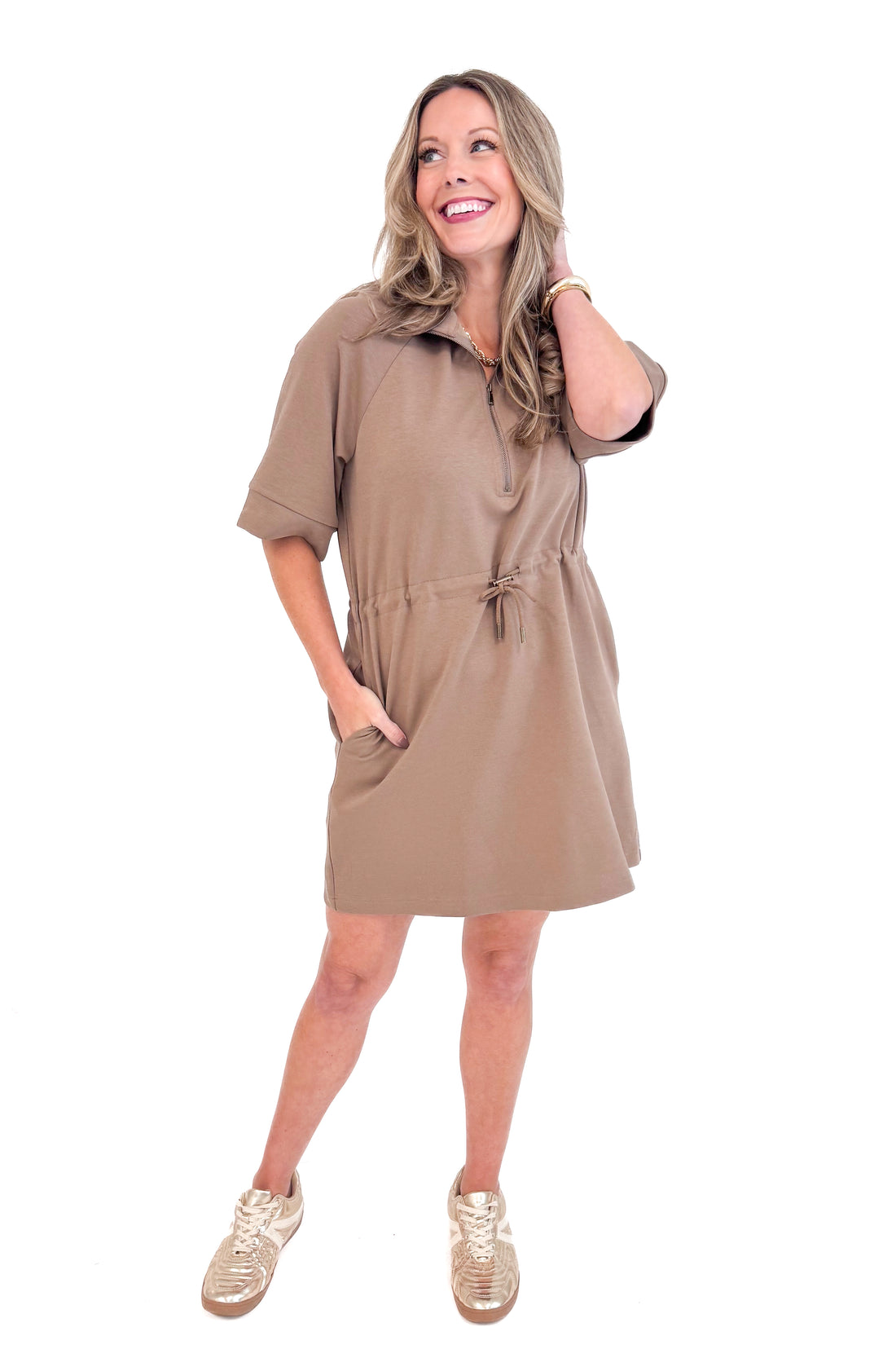 Woman wearing Fireside Glow Mocha 1/4 Zip Half Sleeve Dress by Entro - front view showing quarter zip neckline and half sleeves.