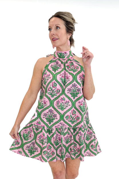 Front view of woman wearing Pink &amp; Green Floral Halter Neck Dress by Entro against white studio background.