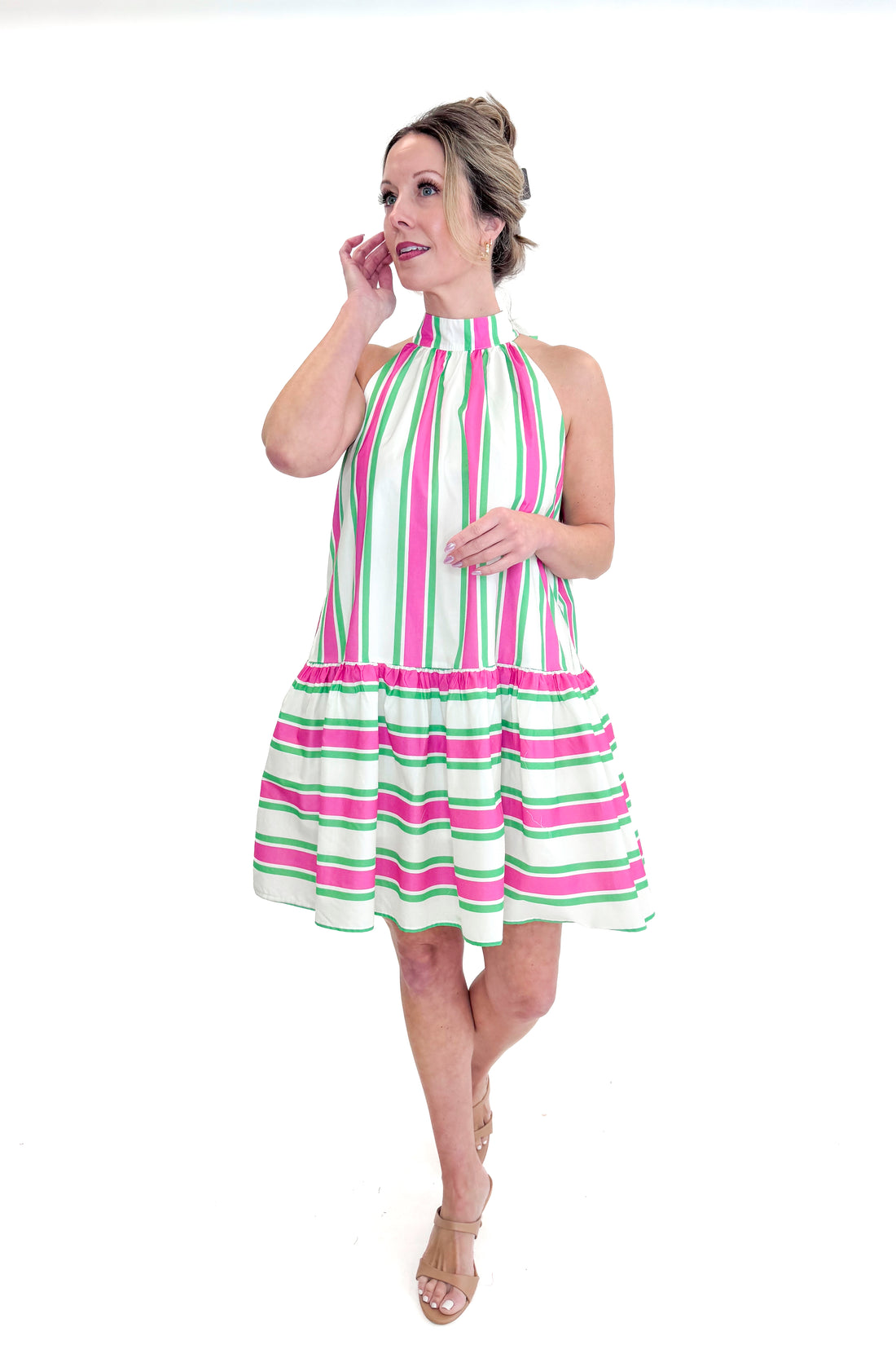 Front view of woman wearing Pink &amp; Green Striped Halter Neck Dress by Entro  against white studio background.