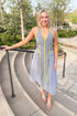 Front view of woman wearing Navy With Green Stripe Detail Halter Midi Dress by Entro outside at a park.