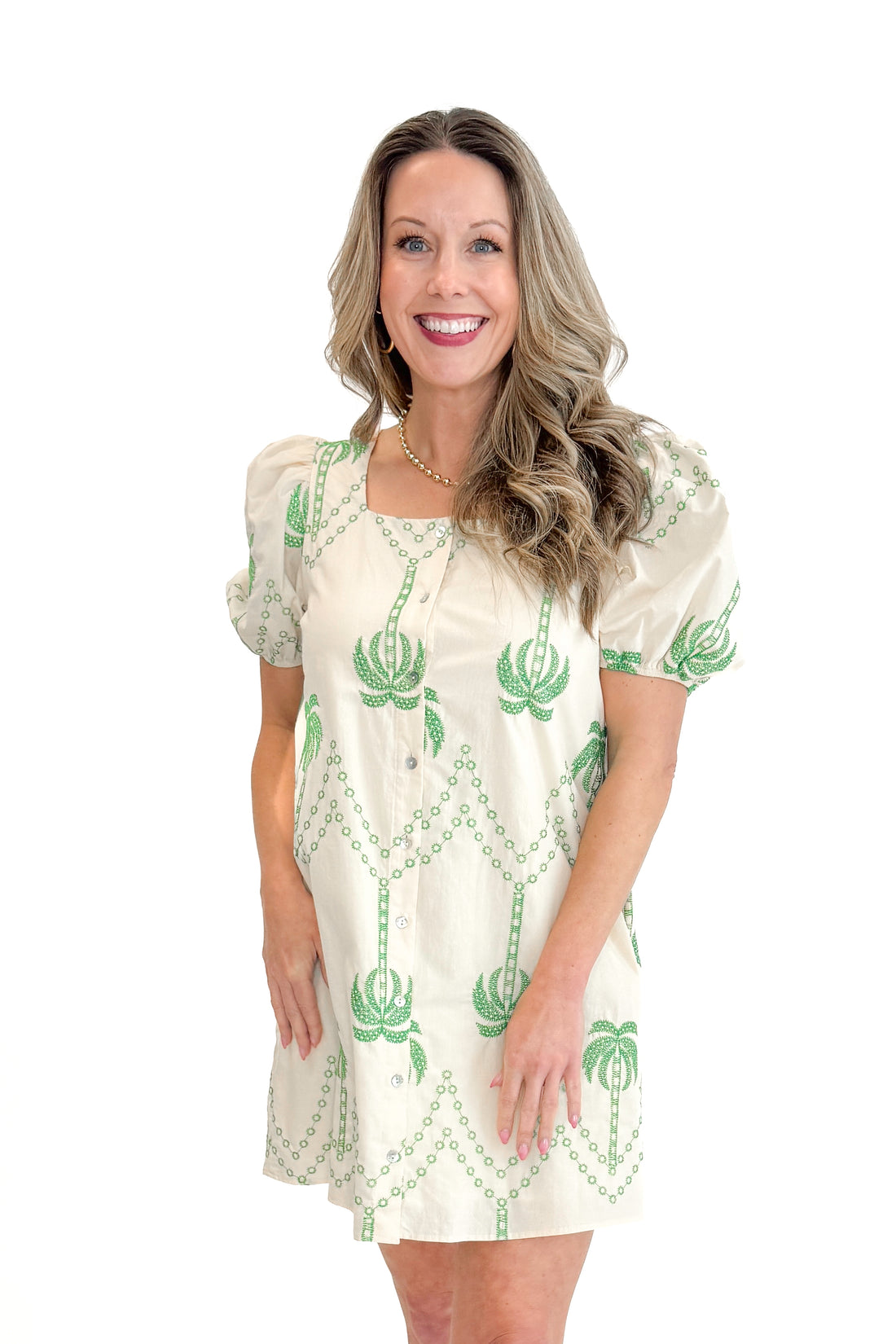 Front view of woman wearing Ecru &amp; Cream Palm Tree Embroidered Dress by Entro with sandals against white studio background.