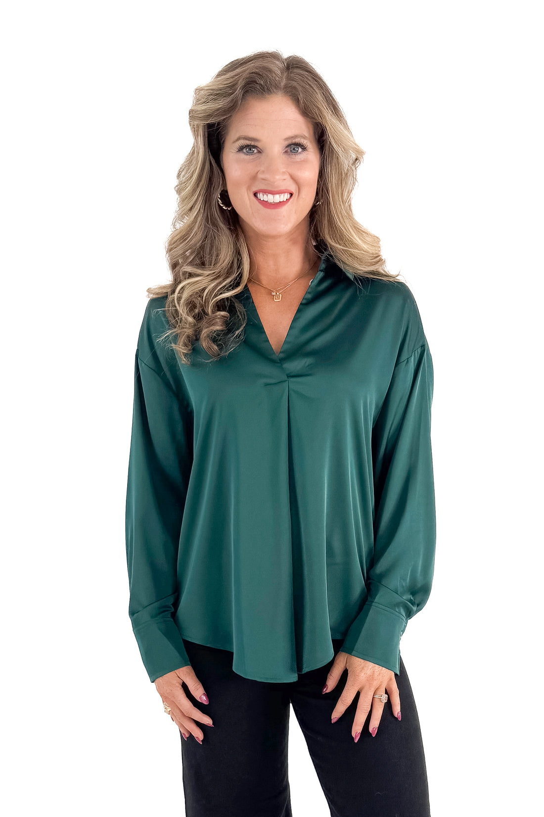 Front view of woman wearing Green Satin Collared V-neck Top with jeans against white studio background.