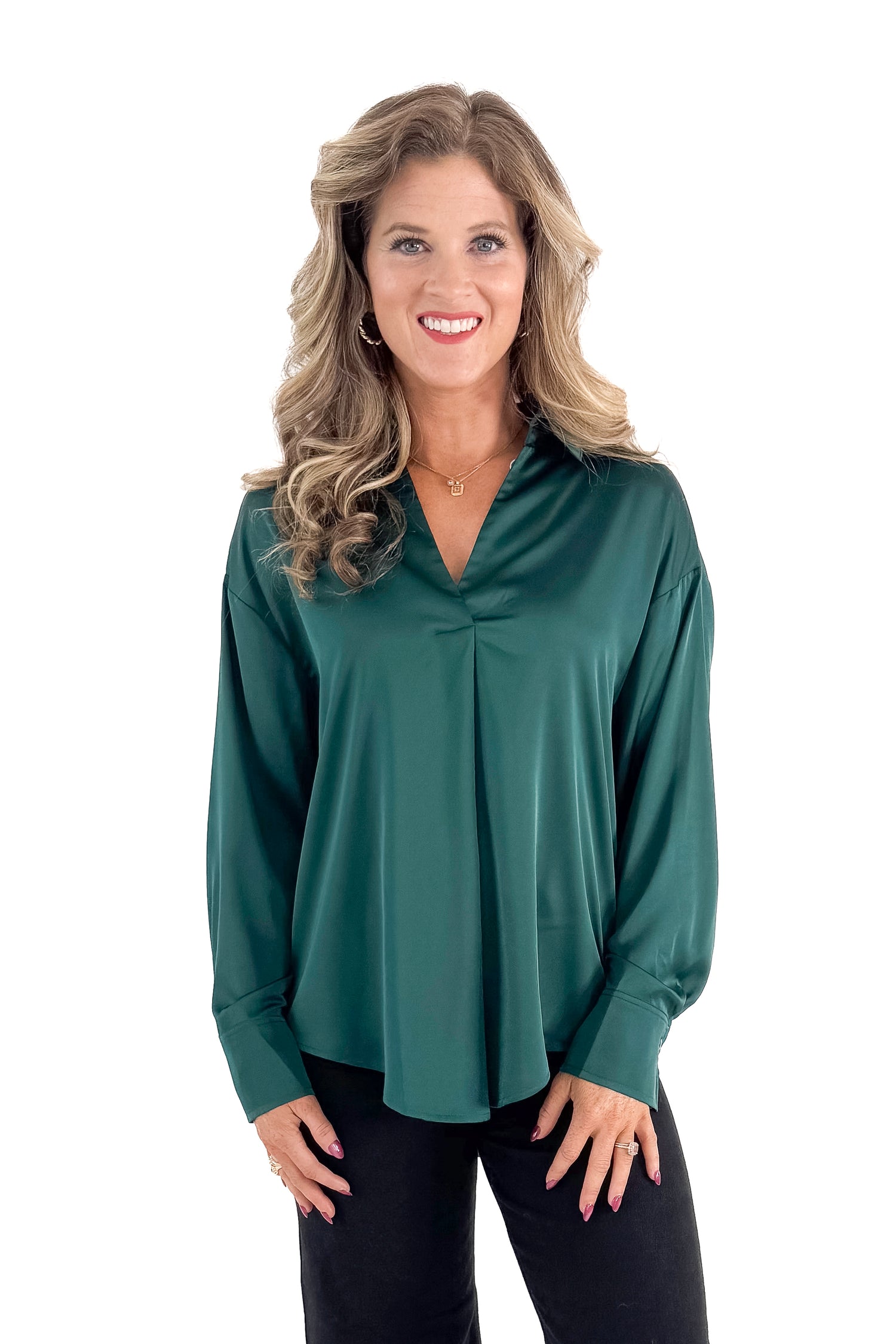 Front view of woman wearing Green Satin Collared V-neck Top with jeans against white studio background.