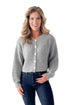 Front view of woman wearing Grey Ribbed Button Up Cardigan with jeans against white studio background.