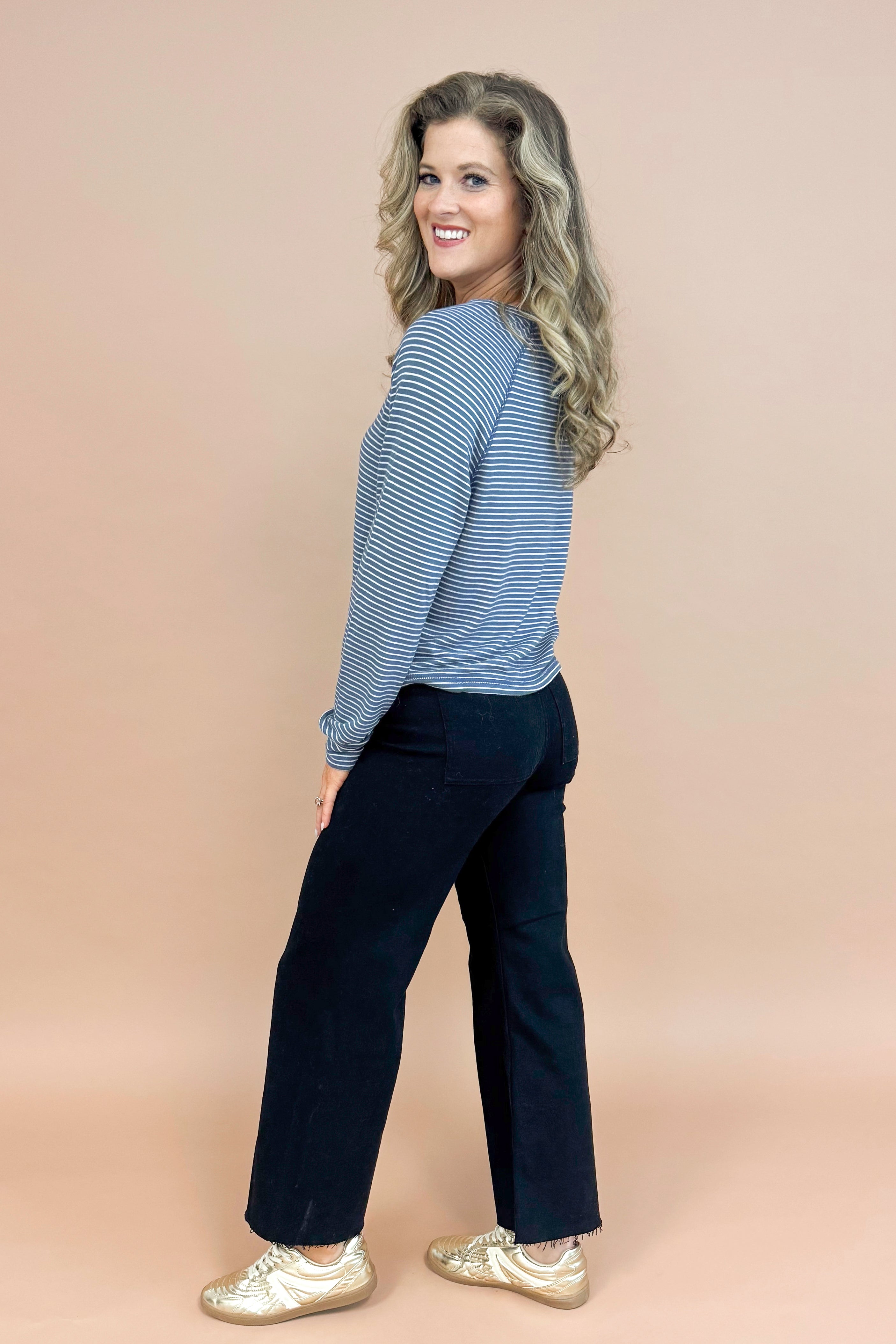 Full Circle navy and cream striped long sleeve top - side full view on model