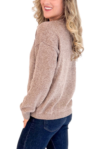 Woman wearing Golden Glow Heathered Brown Center Seam Sweater - side view showing unique center seam design and heathered brown texture