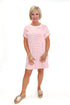 Front view of woman wearing Pink & Cream Striped Short Sleeve Dress against white studio background.