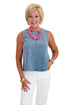 Front view of woman wearing Swagger Boutique’s Denim Seamed Sleeveless Top with jeans against white studio background.