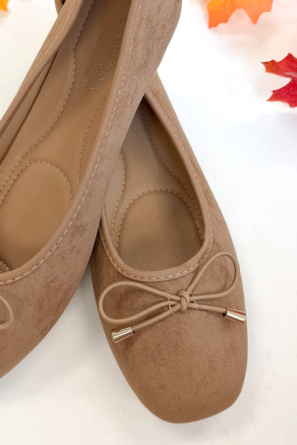Dorothy- Camel Suede Flats against white studio background close up view.