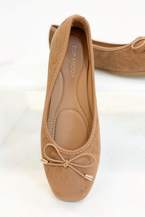 Dorothy- Camel Suede Flats against white studio background front view.