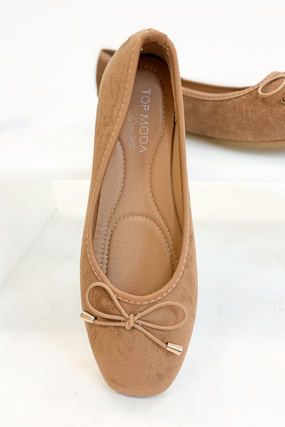 Dorothy- Camel Suede Flats against white studio background front view.