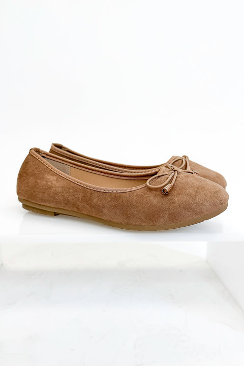 Dorothy- Camel Suede Flats against white studio background side view.