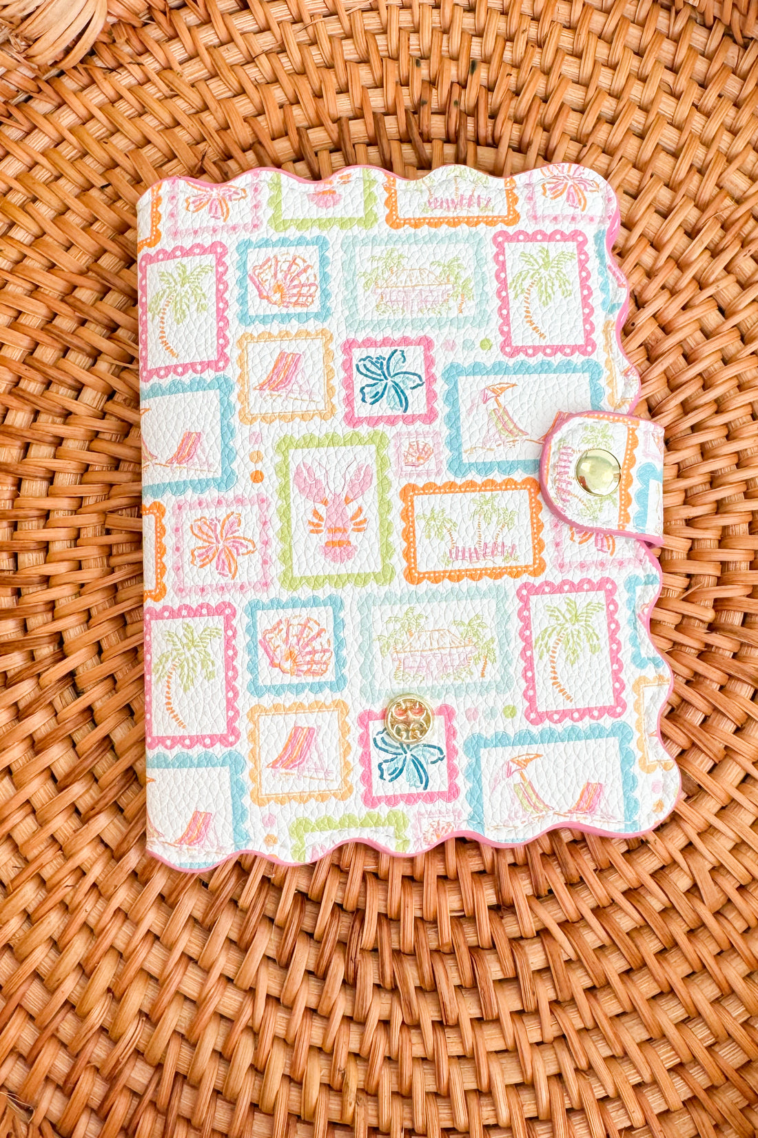 Decorative card with colorful patterns on a woven surface