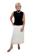 Front view of woman wearing Swagger Boutique’s black top with Ecru Lace Lined Satin Skirt by Entro against white studio background.