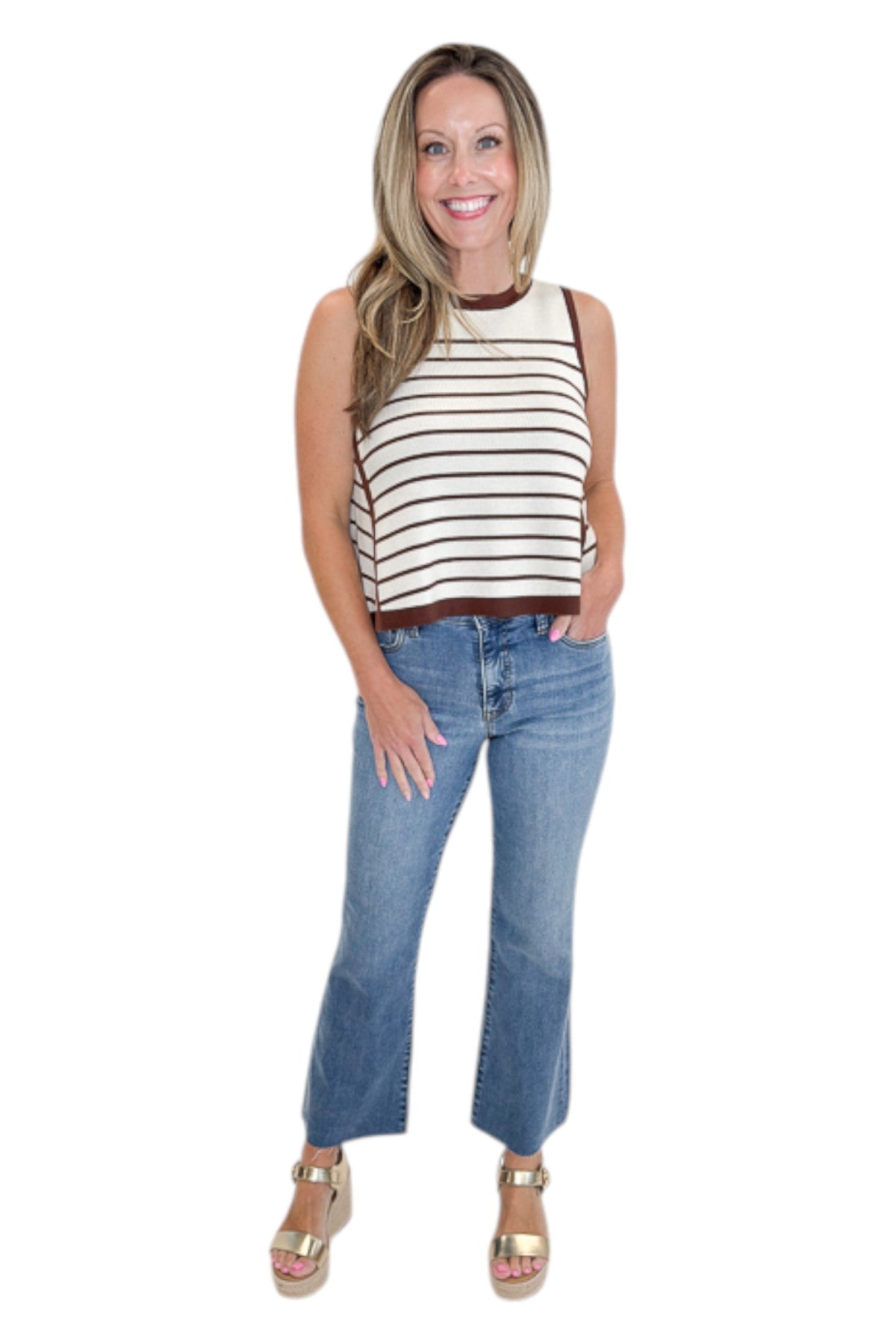 Front view of woman wearing Swagger Boutique’s Ecru &amp; Brown Striped Tank with jeans against white studio background.
