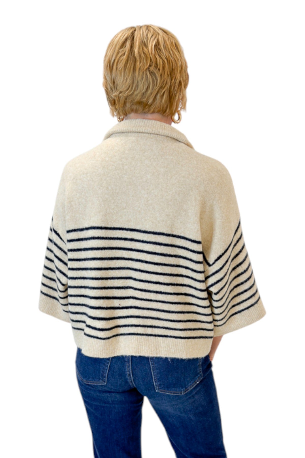 Back view of woman wearing Swagger Boutique’s Ecru &amp; Navy Striped 3/4 Sleeve Sweater by Entro with jeans against white studio background.