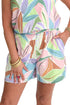 Front view of woman wearing Multi Leaf Print Shorts with matching tank against white studio background.