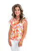 Front view of woman wearing Multi Floral Button Up Top by Fate with jeans against white studio background.