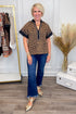 Woman wearing Looking For You Brown Leopard Textured Top by THML - front view showing leopard print pattern and textured fabric.