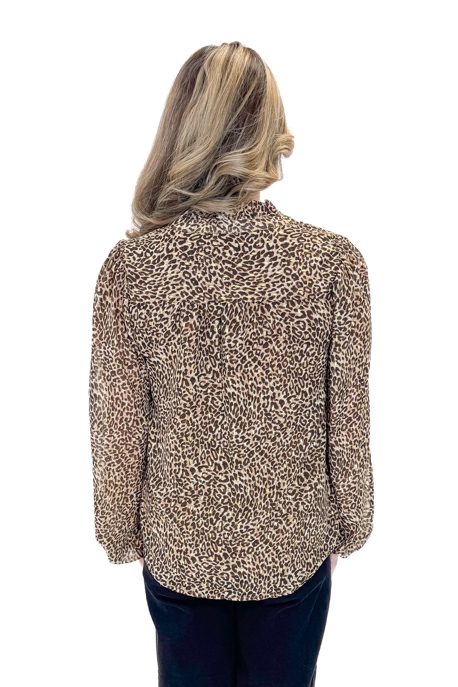 Back view of woman wearing Leopard V-neck With Metallic Detail Top with jeans against white studio background.