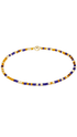 Closeup shot of enewton purple and yellow beaded bracelet