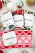 Geometry Festive Holly Dishcloth Set against holiday background.