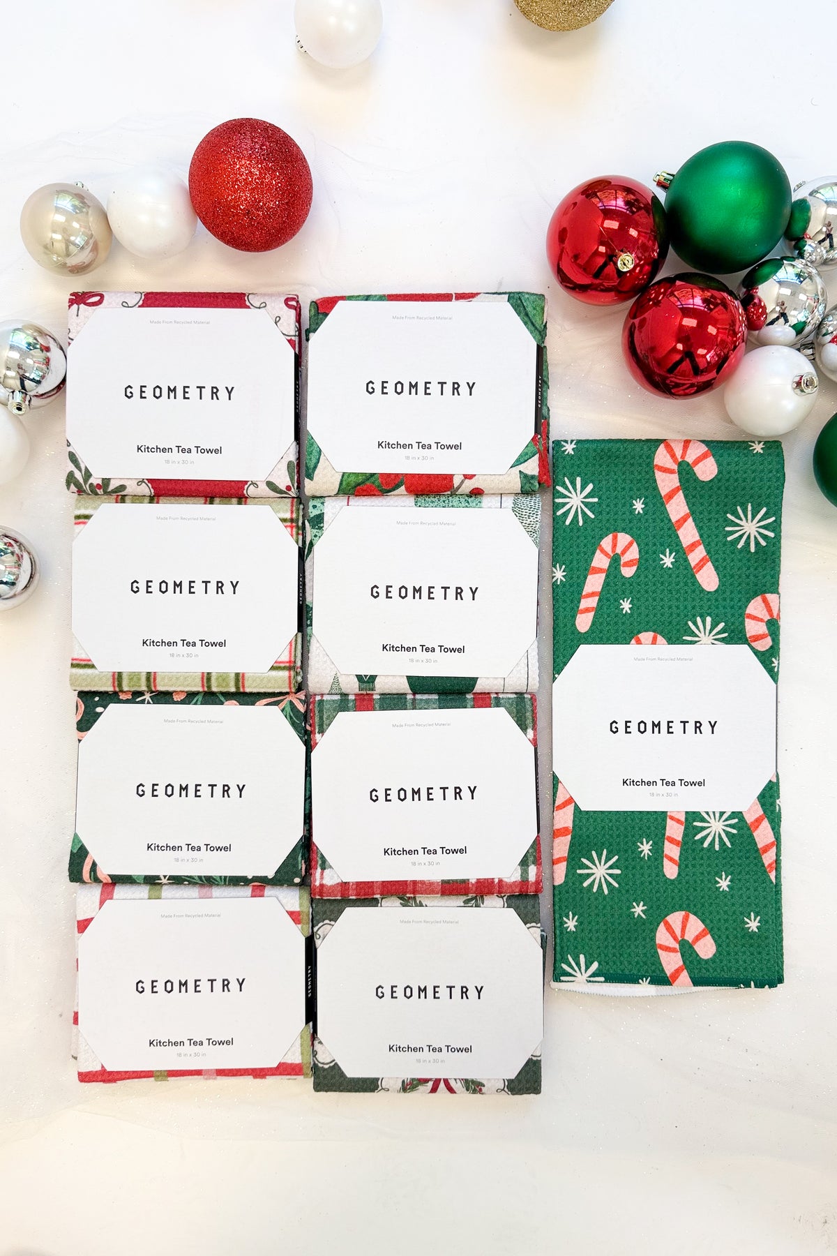 Geometry Sweet Candy Microfiber Tea Towel against holiday background.