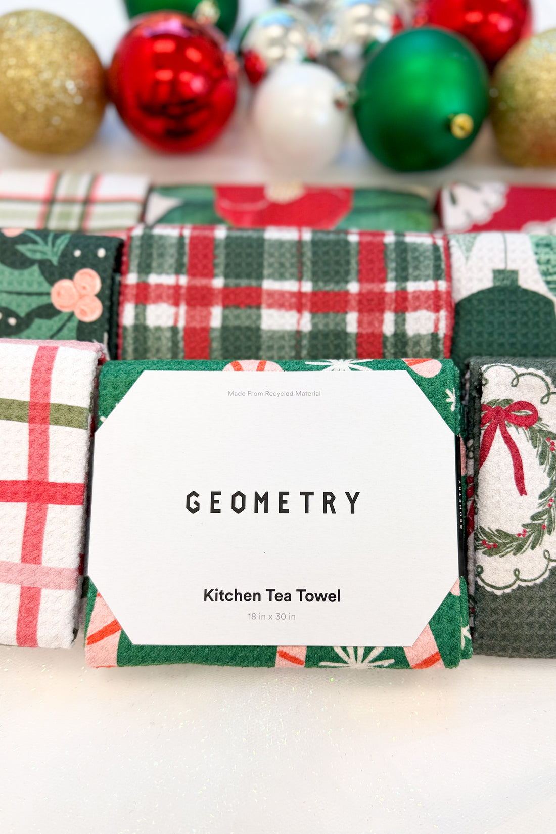 Geometry Sweet Candy Microfiber Tea Towel against holiday background.