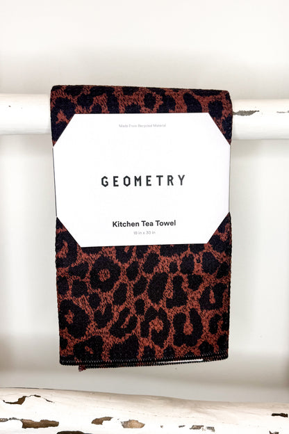 Geometry Midnight Safari Microfiber Tea Towel on ladder
