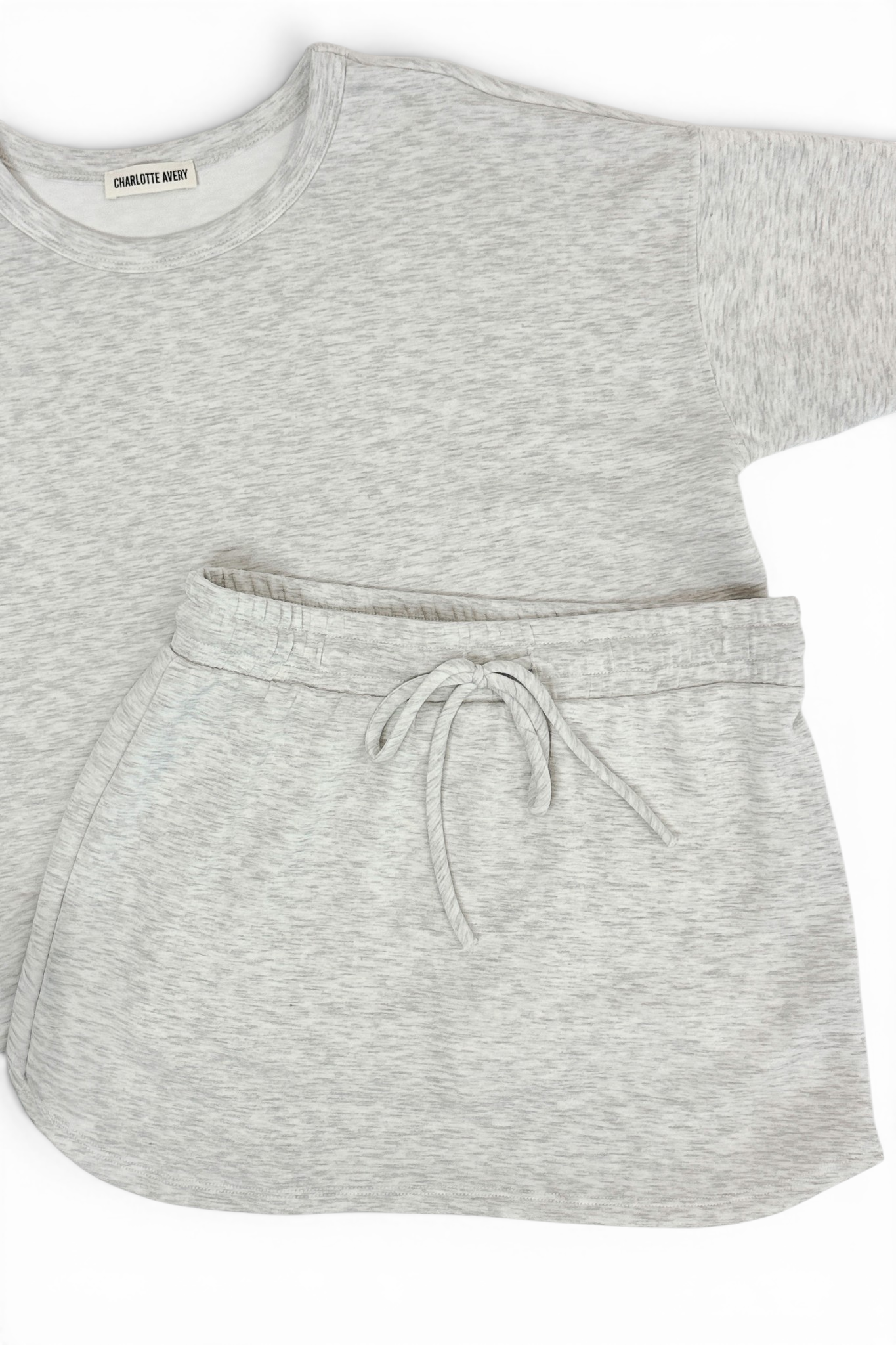 Grey Round Neck Short Sleeve Top with matching Grey Skort against white studio background.