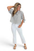 Front view of woman wearing Swagger Boutique’s Grey Striped Tie Sleeve Top with jeans against white studio background.