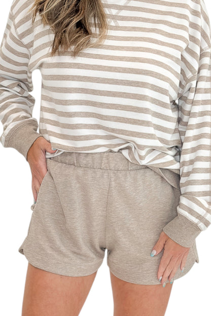Front detail view of woman wearing Swagger Boutique’s Heather Ash The Everyday Striped Crew with Heather Ash The Everyday Short  against white studio background.