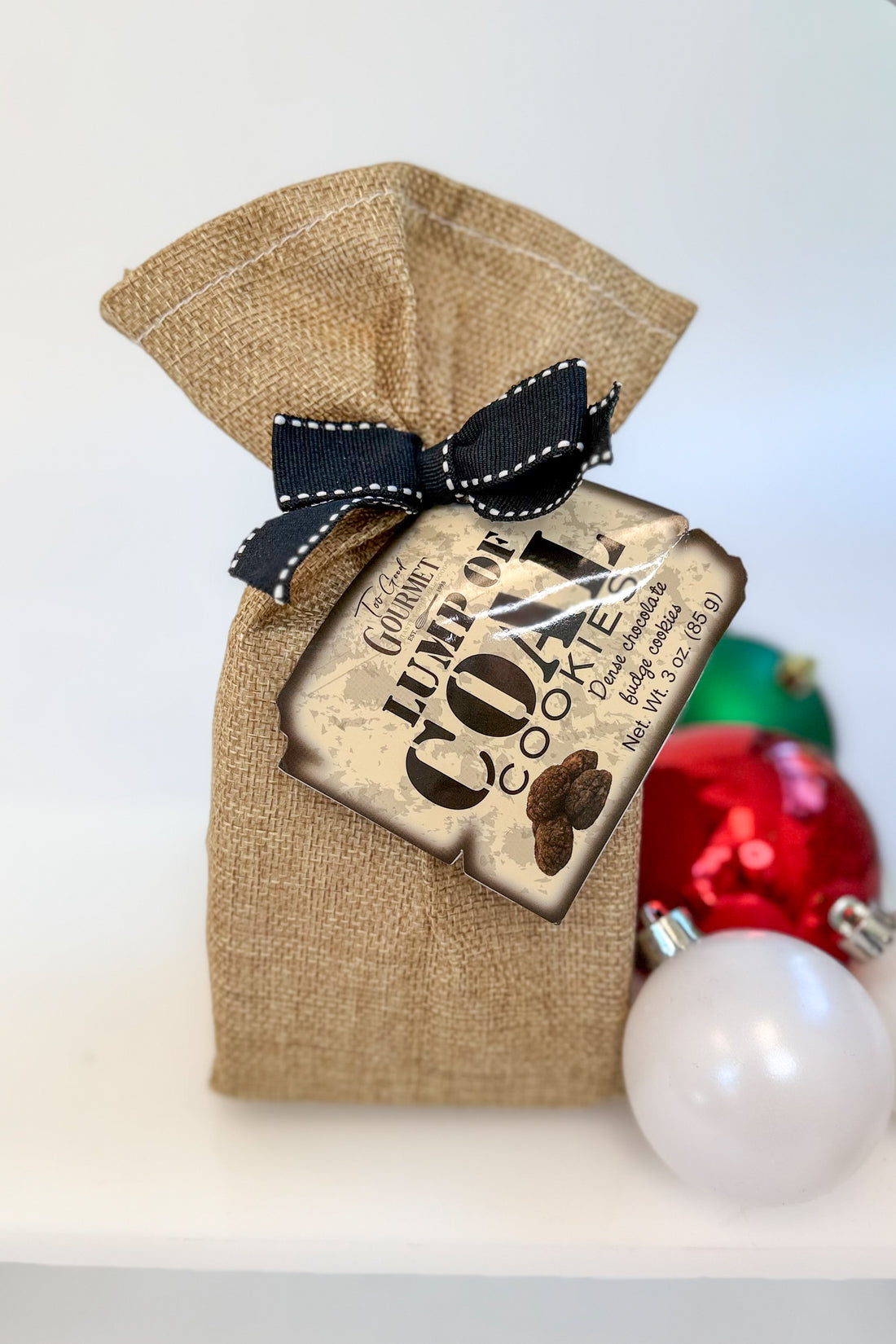 Holiday Lump of Coal Cookies against holiday background.