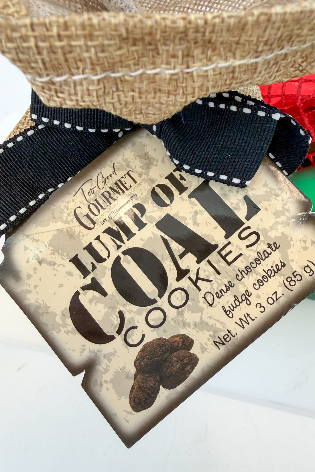 Holiday Lump of Coal Cookies against holiday background.