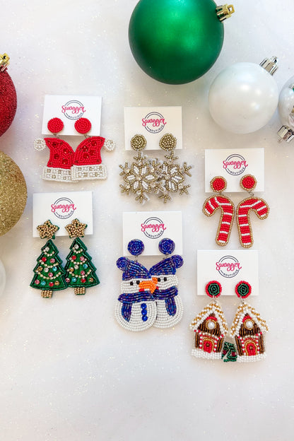 Holiday Spirit Earrings against holiday background.