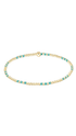 A delicate gold chain bracelet with small turquoise blue bead accents, displayed on a clean white background.