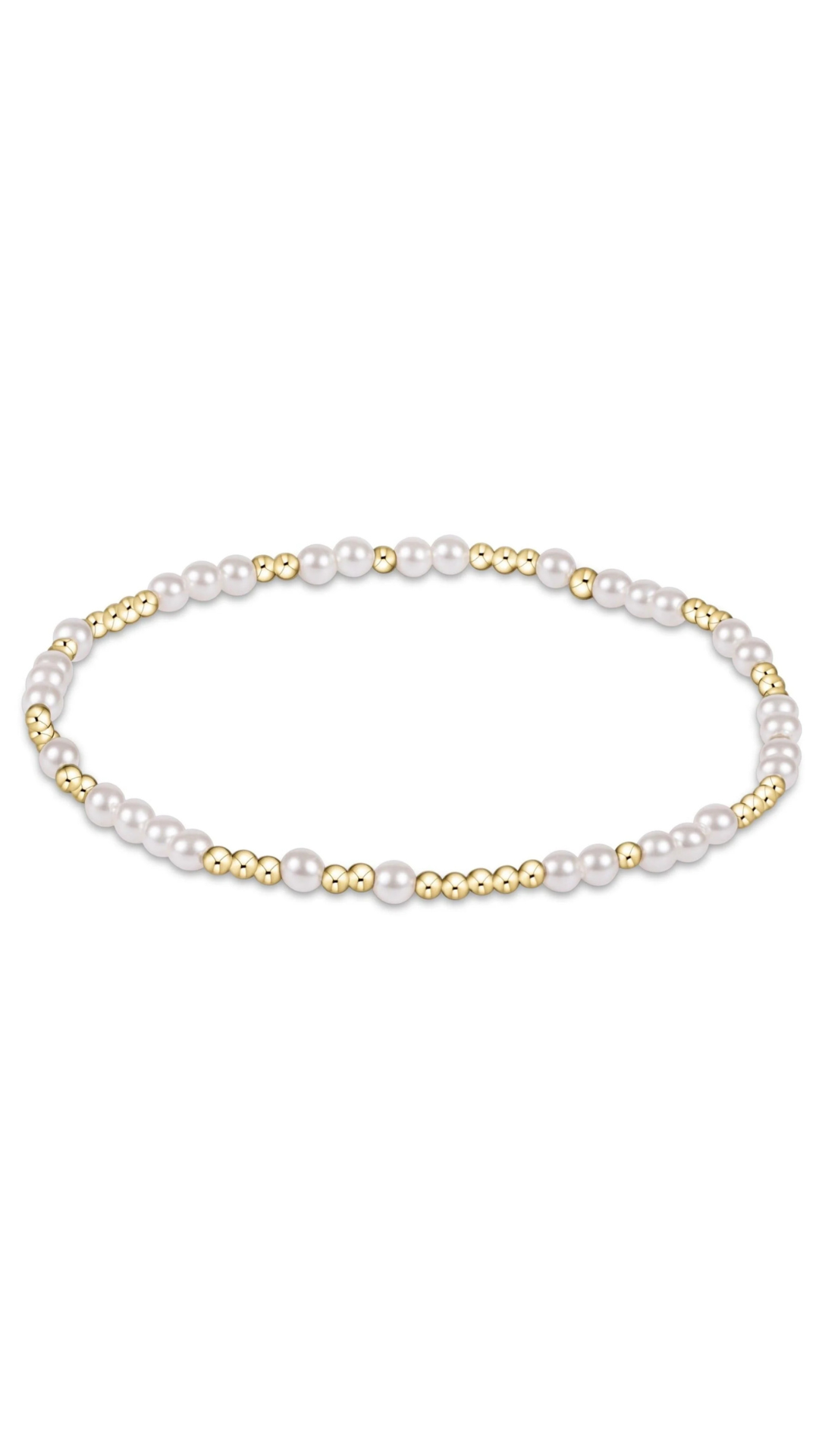 A delicate beaded bracelet featuring white pearls and small polished gold beads, arranged in a horizontal oval on a solid white background.