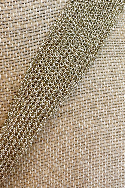 Close up of gold mesh necklace chain 